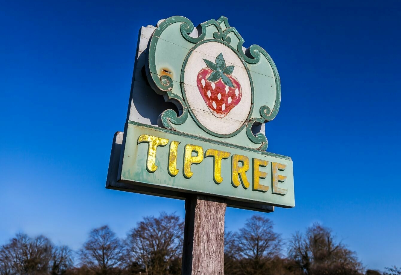 Tiptree village sign - Find your new build house in Essex